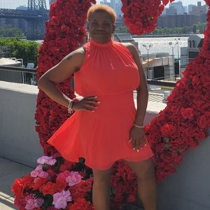 Coral colored flowy lightweight spring/summer dress.